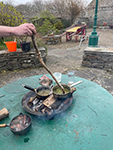 Thomas stirs up some ink from locally foraged bark